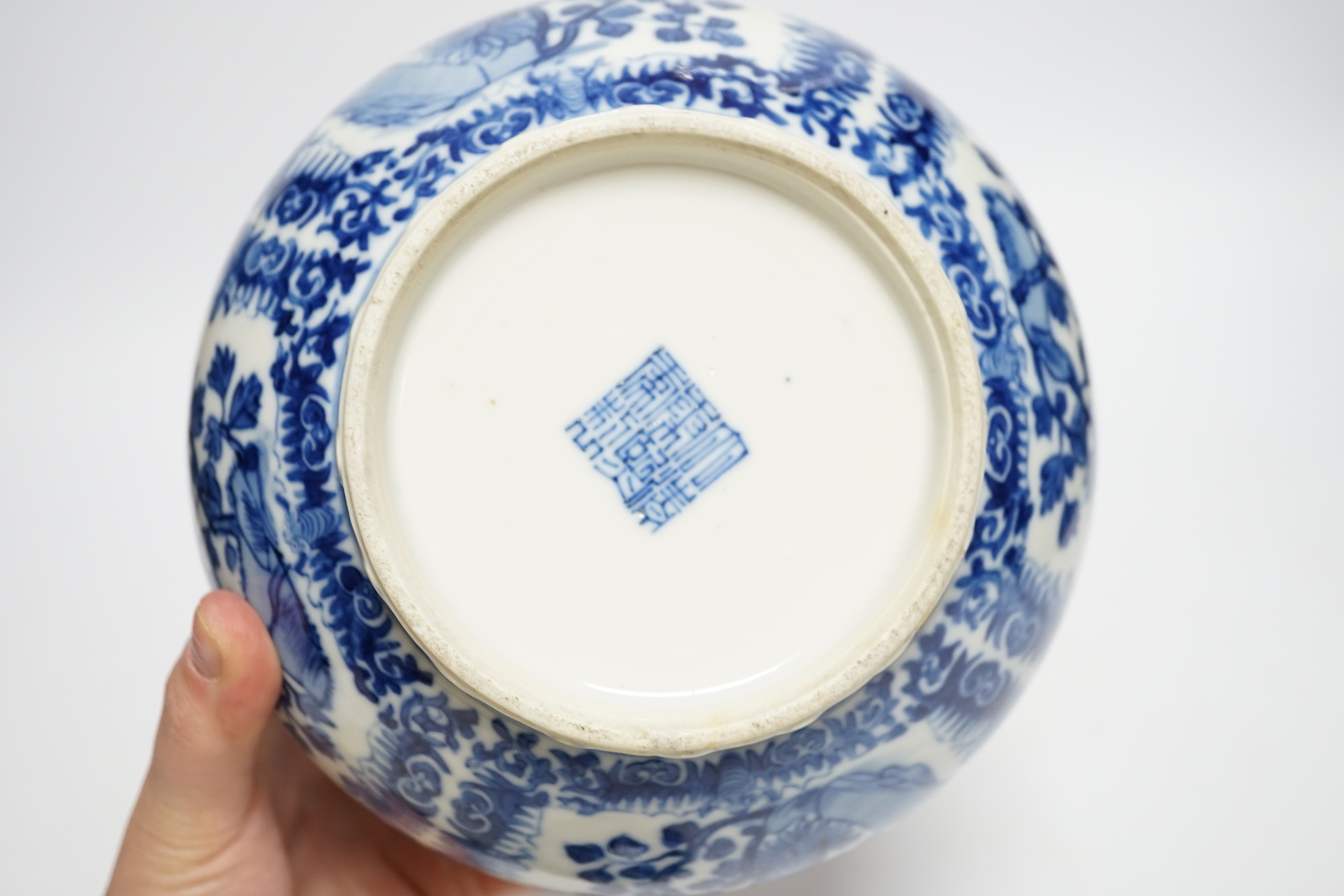 A late 19th century Chinese blue and white floral jar and cover, seal mark, 17cm high